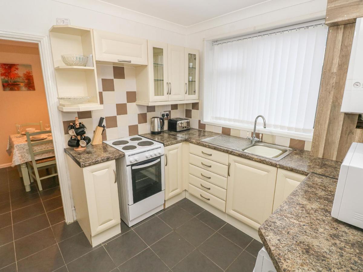 Cwtch Ar Y Mor Villa Burry Port Bagian luar foto